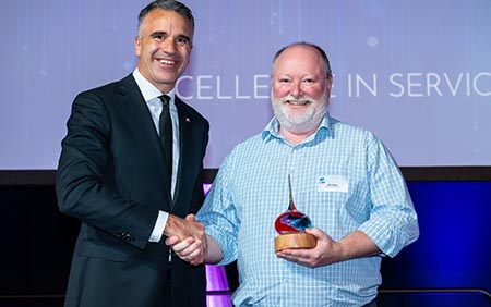 Phil Hespe receiving the award from the Premier of South Australia Peter Malinauskas MP